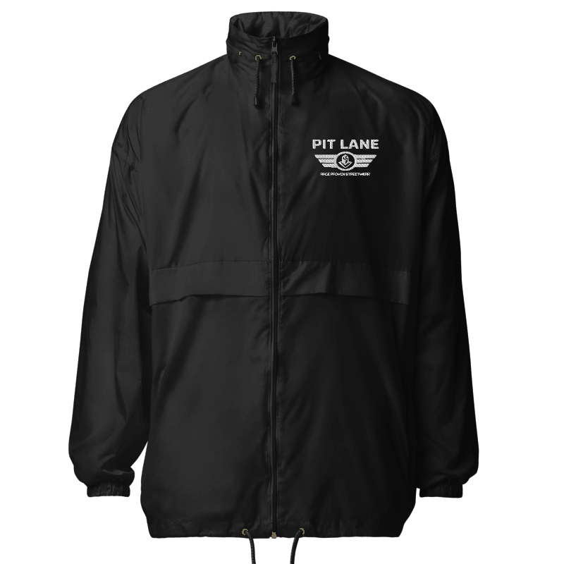 A black zip-up windbreaker jacket with a high collar, featuring a white 'PIT LANE' winged logo printed on the left chest, displayed on a clean white background.