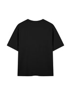Black t-shirt with white text on the back on a light gray background