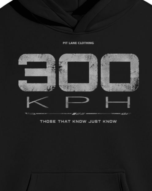A black pullover PIT LANE CLOTHING hoodie with a distressed white graphic on the chest reading '300 KPH' and smaller text above and below, shown on a plain white background.