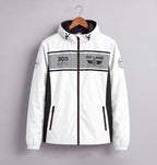 A white hooded jacket with black and gray graphic details, hanging on a wooden hanger against a solid gray background. The jacket features '300 KPH' and 'PIT LANE CLOTHING' text on the chest.