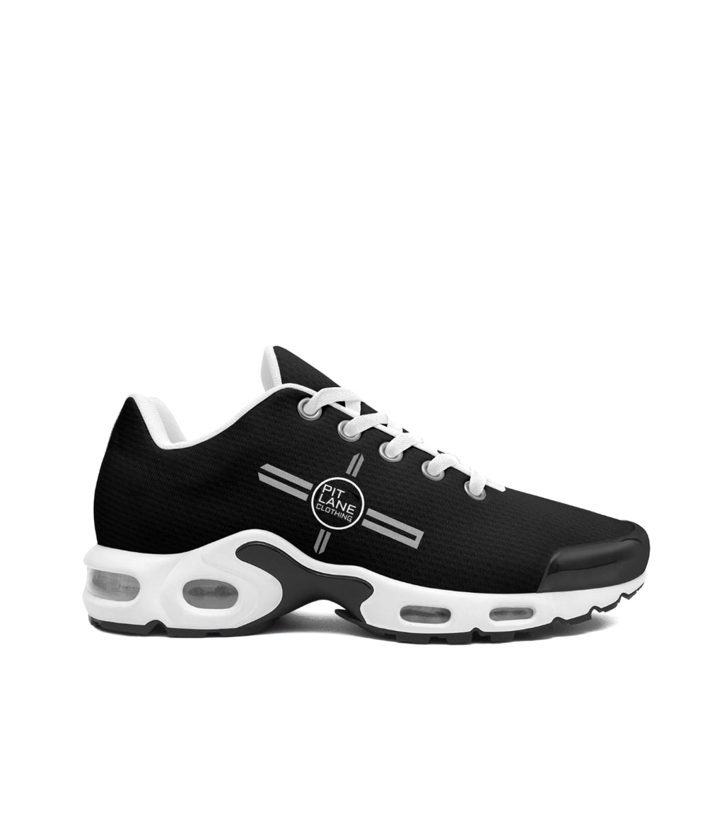 Black Pit Lane Clothing running shoe with white sole on a white background