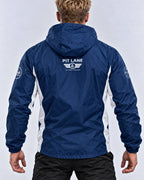 A man viewed from the back wearing a navy blue hooded windbreaker jacket with white side panels and a white 'PIT LANE' logo printed on the upper back.