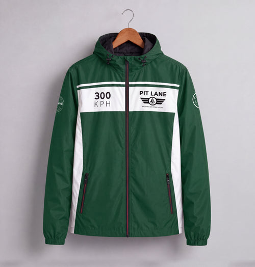 A green and white hooded windbreaker jacket hanging on a wooden hanger against a light gray background. The jacket features '300 KPH' and 'PIT LANE CLOTHING' graphics on the chest, with zippered pockets and a full front zipper.