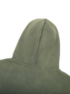 Green hooded jacket on a white background