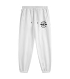 White sweatpants with a black circular winged logo on the left thigh that reads 'PIT LANE CLOTHING', shown against a plain white background.