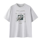 A light gray heather crewneck t-shirt featuring a central graphic print with the text 'PIT LANE CLOTHING' and 'APEX' surrounding a stylized illustration of a race car.