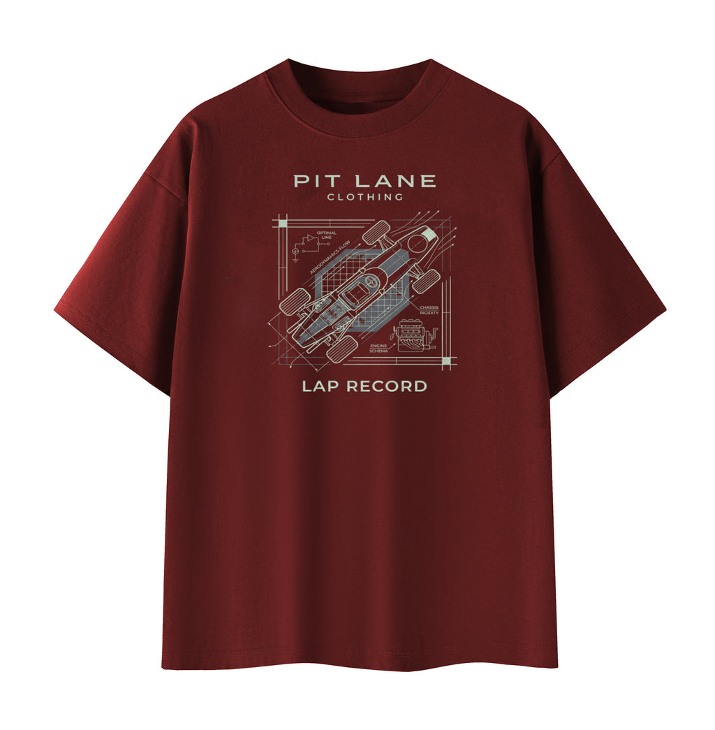 A dark red crewneck t-shirt with a white and gray graphic print on the front featuring a race car schematic and the text 'PIT LANE CLOTHING' and 'LAP RECORD'.