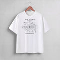 A white short-sleeve crewneck t-shirt hanging on a wooden hanger against a light gray wall. The shirt features a black graphic print of a circular mechanical design resembling a sci-fi helmet or engine schematic, with the text 'PIT LANE CLOTHING' above and 'DOWNFORCE' below.