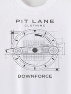 White short-sleeve t-shirt featuring a black technical blueprint-style graphic of a race car inside a circular clock-like frame, with the text 'PIT LANE CLOTHING' above and 'DOWNFORCE' below.